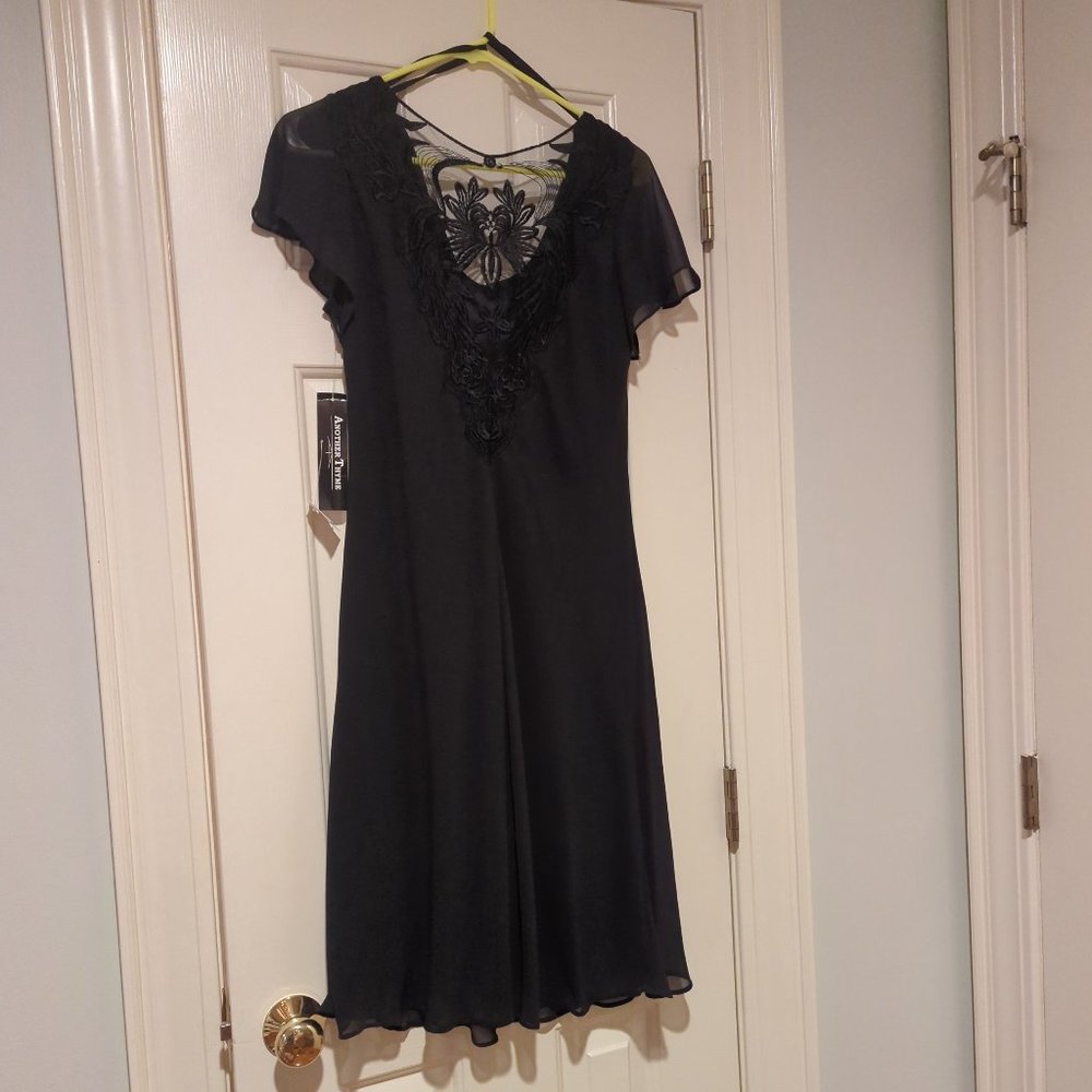 Black dress with lace neckline